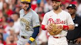 Rhys Hoskins homers in return to Philadelphia, but David Dahl goes deep as Phillies beat Brewers