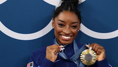 The Meaning Behind Simone Biles’s Sparkly Goat Necklace Is Iconic