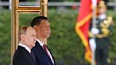 Vladimir Putin and Xi Jinping sign deal to deepen Russia-Chinese partnership