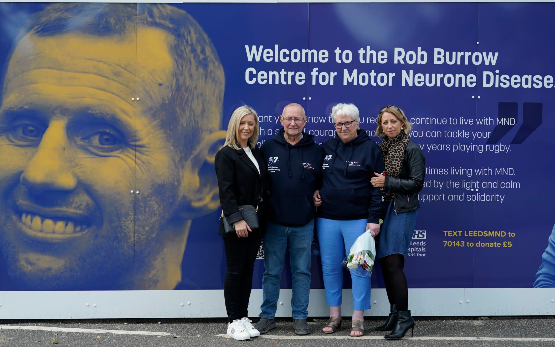 Rob Burrow’s parents shed tears day after son’s death at ground breaking for MND centre