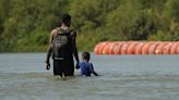 Texas defends floating border wall to appeals court as defense against migrant ‘invasion’