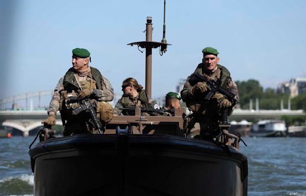 In and on the water, French troops secure the River Seine for the Paris Olympics opening ceremony