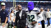 Seattle Seahawks celebrate with blue ski mask in locker room after beating Detroit Lions