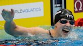 Katie Ledecky wins gold in 1,500 at the swimming worlds to tie mark set by Michael Phelps