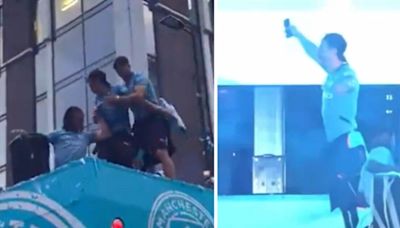 Jack Grealish nearly falls off Man City bus twice as players enjoy boozy party