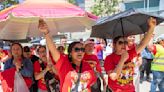 Dangerous heat wave during 'hot labor summer' — how picketing workers brave the sun