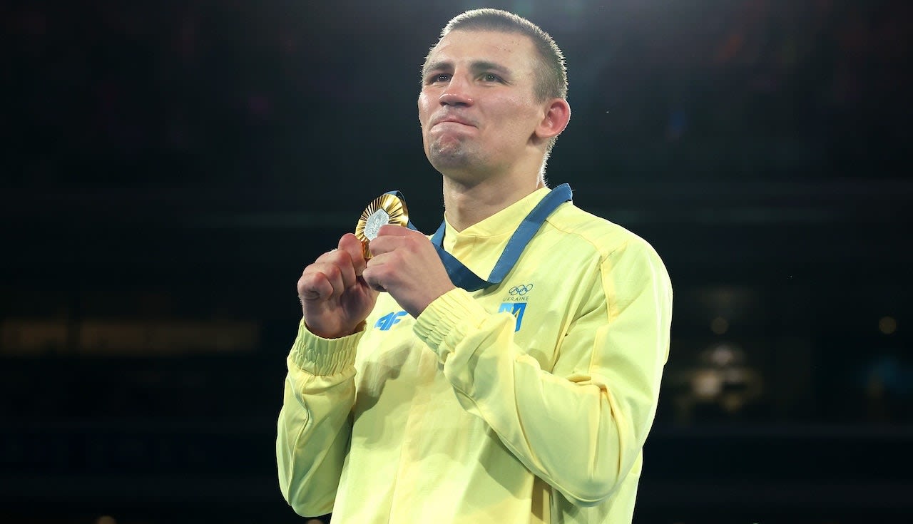 Ukraine's Volodymyr Zelenskyy thanks boxer Oleksandr Khyzhniak for Olympic gold amid Russian war