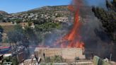 Urgent evacuation order issued in Greece over raging wildfires in 38°C heat