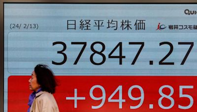 Asia rides Wall St rally, dollar sags on inflation relief