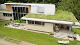 Family shows off the minimalist solar-powered dream home they built in the middle of the forest: ‘It feels normal’