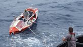 Australian adventurer on rowing expedition across Pacific Ocean rescued after homemade boat capsizes