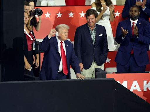 Trump, with bandaged ear, excites GOP convention in first post-shooting appearance