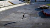 The loneliness of an Olympic athlete training in wartime Ukraine through an AP photographer’s lens