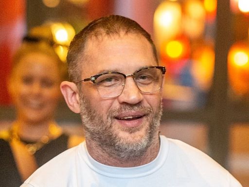 Tom Hardy looks almost unrecognisable outside London restaurant