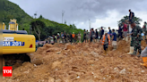 The search intensifies for dozens buried in an Indonesian landslide that killed at least 23 people - Times of India