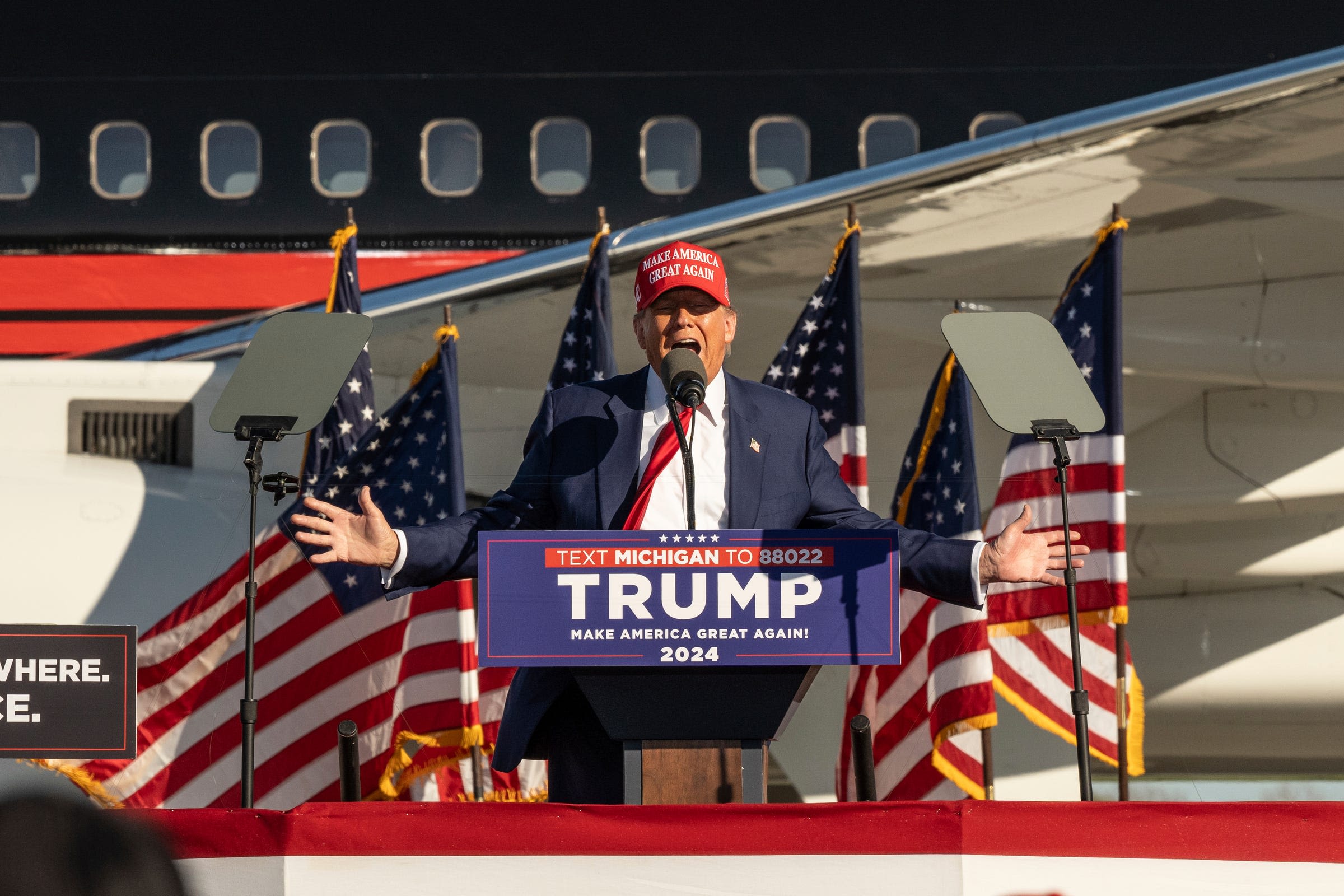 Trump repeats false fraud claims, vows to prevent cheating in Michigan speech