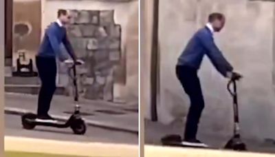 Moment Prince William zooms around Windsor Castle on electric scooter