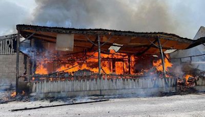 Major barn blaze forces eco-campsite's closure