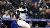 Charlie Blackmon's 2-run double in the 8th inning leads Rockies past Rangers 4-2