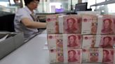 Sliding yen stirs fear of China yuan devaluation that could rock global markets