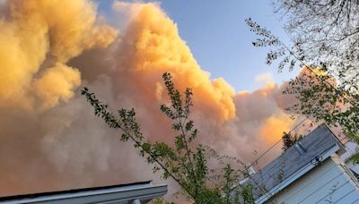 Thousands flee as wildfire threatens Fort Nelson, B.C. sets up emergency supports