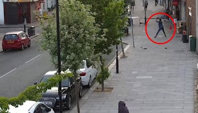 Moment gunman whips weapon from holster & opens fire on busy high street as terrified shoppers and kids cower in fear