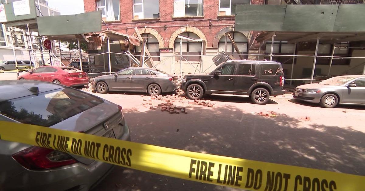 Surveillance video shows dust filling street as Brooklyn building partially collapses