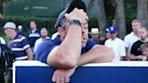 Rory McIlroy holds his nerve with birdie amid farcical scenes at Wentworth