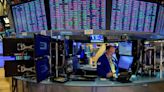 US stocks trade mixed amid earnings rush and fresh economic data