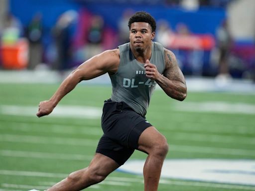 Miami Dolphins bolster pass rush, taking Chop Robinson of Penn State with 21st pick of NFL draft