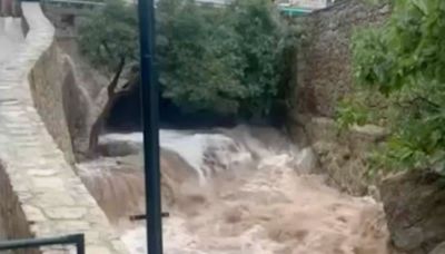 Moment flood surges through Majorca as Brit hiker killed & boyfriend missing