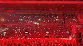 Pink takes to the sky at Anfield Stadium as she flies above the Kop