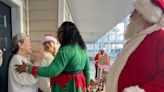 Mr. and Mrs. Claus deliver gifts to senior living community