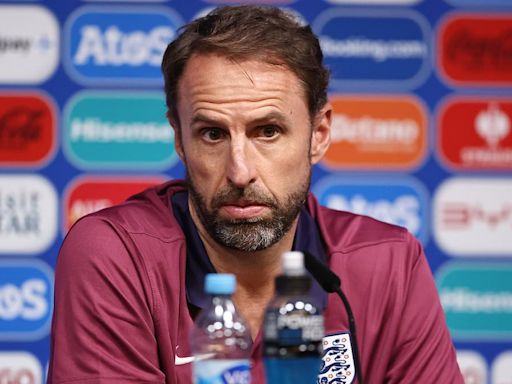 England fans serenade German police officer and Southgate LOOKALIKE