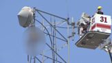 Tulsa Police and Fire help man who climbed antenna tower come down safely