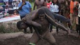 Tangling in mud, young Ugandans hold pro wrestling dreams