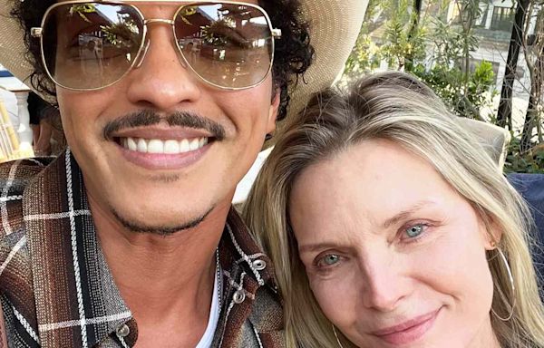 Michelle Pfeiffer Takes Selfie with Bruno Mars After 'Uptown Funk' Lyrics Namecheck Her: 'Look Who I Ran Into'