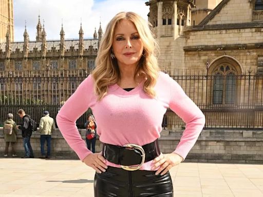 Carol Vorderman shows off her incredible curves at 63 as she poses in tight top and PVC trousers