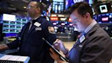 Wall St ends sharply lower as sticky inflation dims rate cut hopes