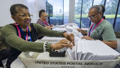 Election officials warn that widespread problems with the US mail system could disrupt voting