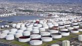 Analysis-Lower oil prices defy robust forecasts for global demand