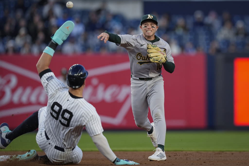 Aaron Boone’s family member goes deep for A’s as Yankees settle for series split