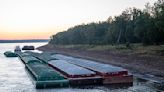 Barges grounded by low water halt Mississippi River traffic