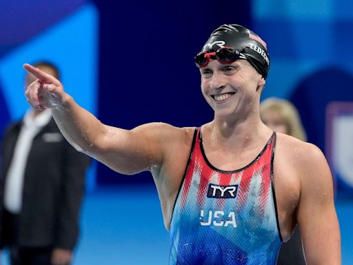 C is for Champion: Katie Ledecky meets Sesame Street's Cookie Monster and Elmo at Paris Games