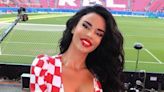 Croatian model Ivana Knoll reacts as her side draw against Italy