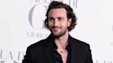 Former James Bond George Lazenby Endorses Aaron Taylor-Johnson for the Role