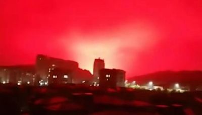 Moment sky turns BLOOD RED over Chinese city sparking fears of armageddon