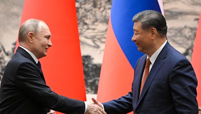 Putin and Xi meet in Beijing as countries deepen ties