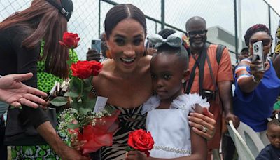 Meghan Markle Has Sweet 'Auntie' Moment with Young Fan on Day Two in Nigeria