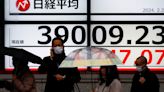 Nomura traders burst into applause as Nikkei hits record high